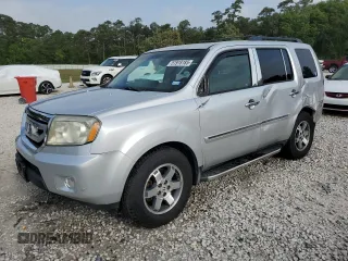 2009 Honda Pilot Touring z VIN 5FNYF48849B056234, wystawiony jako Copart lot #51918185 z przebiegiem 139 985 mil mil oraz Szkoda całkowita • Salvage title. Historia ofert i sprzedaży dostępna na DreamBid. Obrazek 1.