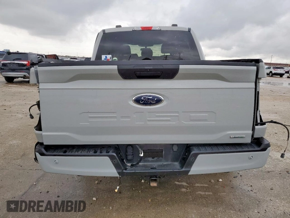 2023 Ford F-150 XL with VIN 1FTEW1CP8PKD11810, listed as a Copart auction lot 60453315 with 83,312 mi miles and Salvage title. Bid and sale history available at DreamBid. Image 6.