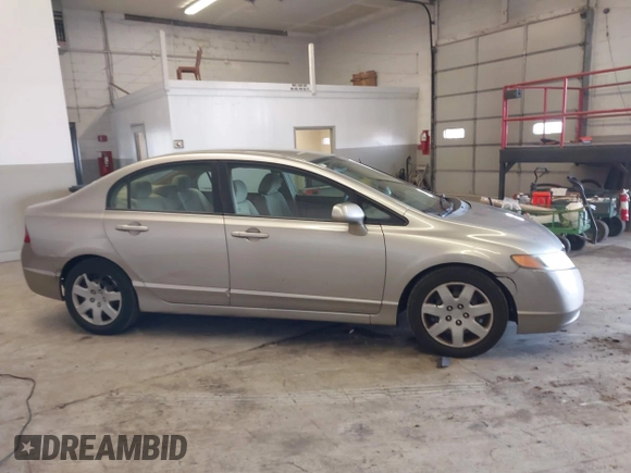 2006 Honda Civic LX z VIN 1HGFA16556L005459, wystawiony jako IAAI lot #41940768 z przebiegiem 178 595 mil mil oraz . Historia ofert i sprzedaży dostępna na DreamBid. Obrazek 13.