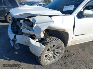 2016 Chevrolet Silverado 1500 LT with VIN 3GCUKREC6GG306239, listed as a IAAI auction lot 41380251 with 128,042 mi miles. Bid and sale history available at carsss.com. Image 18.