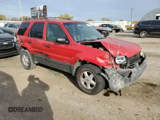 2002 Ford Escape XLS Value with VIN 1FMYU01B82KC15443, listed as a Copart auction lot 77998164 with 212,313 mi miles and Salvage title. Bid and sale history available at DreamBid. Image 4.