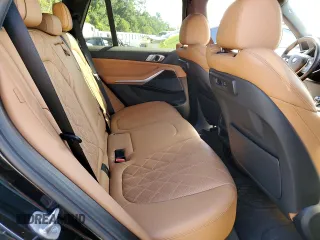 2023 BMW X5 xDrive40i with VIN 5UXCR6C04P9P15644, listed as a Copart auction lot 60710885 with 49,077 mi miles and Salvage title. Bid and sale history available at DreamBid. Image 11.