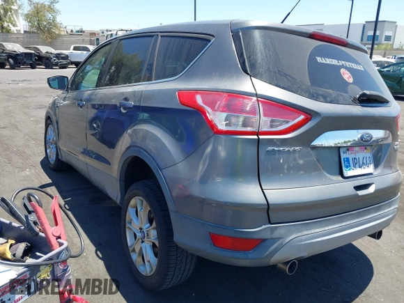 2013 Ford Escape SEL with VIN 1FMCU0H99DUA94443, listed as a IAAI auction lot 42713849 with 84,374 mi miles and . Bid and sale history available at DreamBid. Image 3.