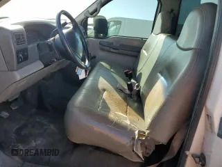 2001 Ford F-450 XL with VIN 1FDXF46F11EA30091, listed as a Copart auction lot 77682024 with 155,351 mi miles and Salvage Title. Bid and sale history available at carsss.com. Image 7.