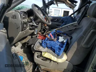 2004 GMC Envoy XL SLE with VIN 1GKET16S346115131, listed as a Copart auction lot 82677024 with 290,656 mi miles and Salvage Title. Bid and sale history available at carsss.com. Image 7.