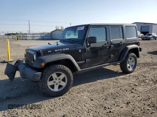 2011 Jeep Wrangler Unlimited Rubicon with VIN 1J4BA6H1XBL634093, listed as a Copart auction lot 54054675 with 134,097 mi miles and Salvage title. Bid and sale history available at DreamBid. Image 1.