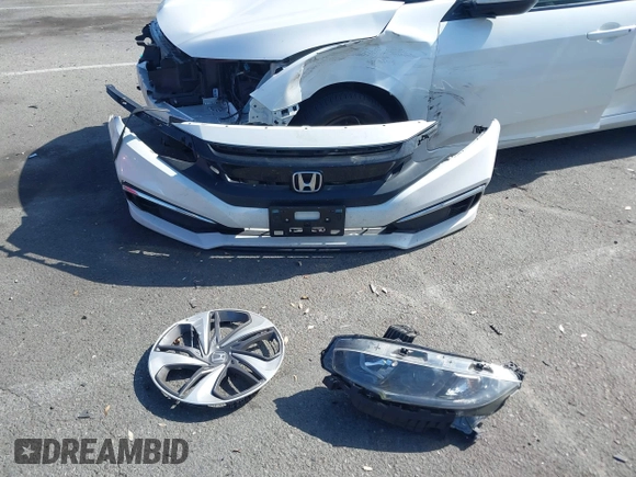 2020 Honda Civic LX z VIN 19XFC2F67LE212561, wystawiony jako IAAI lot #42272481 z przebiegiem 50 681 mil mil oraz . Historia ofert i sprzedaży dostępna na DreamBid. Obrazek 12.