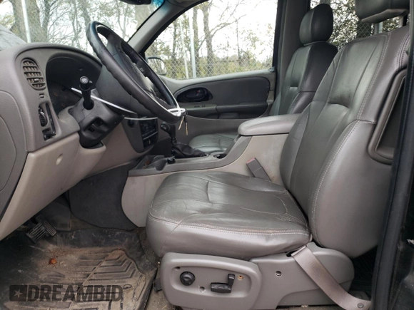 2003 Chevrolet TrailBlazer EXT LT with VIN 1GNET16P536232996, listed as a Copart auction lot 79389154 with 191,213 mi miles and Clean Title. Bid and sale history available at DreamBid. Image 7.