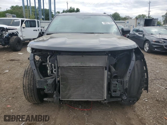 2023 Ford Explorer XLT with VIN 1FMSK8DH3PGA58229, listed as a Copart auction lot 58571525 with 64,536 mi miles and Salvage title. Bid and sale history available at DreamBid. Image 5.