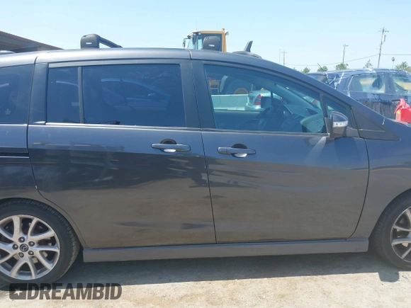 2014 Mazda 5 Grand Touring with VIN JM1CW2DL8E0171095, listed as a IAAI auction lot 41962650 with 85,048 mi miles and . Bid and sale history available at DreamBid. Image 13.