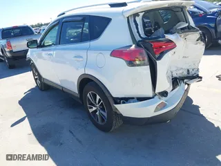 2016 Toyota RAV4 XLE with VIN JTMWFREV3GJ082487, listed as a IAAI auction lot 41833158 with 107,332 mi miles. Bid and sale history available at carsss.com. Image 3.