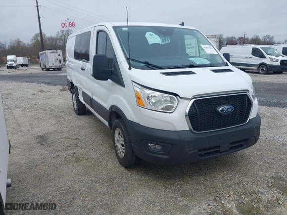 2021 Ford Transit Cargo Van with VIN 1FTBR1Y82MKA44171, listed as a IAAI auction lot 41857534 with 26,295 mi miles. Bid and sale history available at carsss.com. Image 1.
