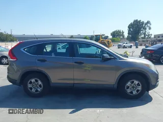 2013 Honda CR-V LX with VIN 3CZRM3H34DG705066, listed as a IAAI auction lot 42661478 with 318,027 mi miles and . Bid and sale history available at DreamBid. Image 13.