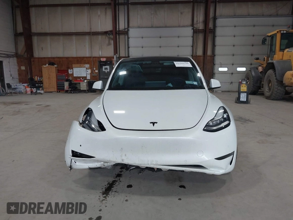 2020 Tesla Model Y Long Range z VIN 5YJYGDEE5LF041935, wystawiony jako IAAI lot #42369750 z przebiegiem 79 540 mil mil oraz . Historia ofert i sprzedaży dostępna na DreamBid. Obrazek 13.
