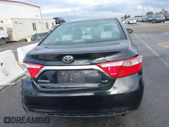 2015 Toyota Camry XLE with VIN 4T4BF1FK9FR461402, listed as a IAAI auction lot 41772628 with 92,795 mi miles and . Bid and sale history available at DreamBid. Image 16.