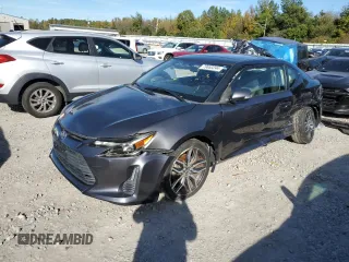 2016 Scion tC with VIN JTKJF5C71GJ024328, listed as a Copart auction lot 79653244 with 0 mi miles and Salvage Title. Bid and sale history available at carsss.com. Image 1.