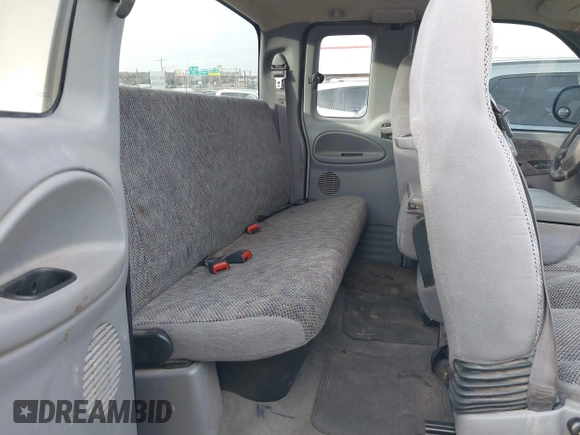 1999 Dodge Ram 2500 with VIN 3B7KC2363XG124121, listed as a IAAI auction lot 41404032 with 250,307 mi miles. Bid and sale history available at carsss.com. Image 8.