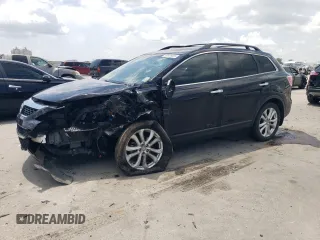 2012 Mazda CX-9 Grand Touring with VIN JM3TB2DA4C0361023, listed as a Copart auction lot 63839005 with 140,784 mi miles and Salvage title. Bid and sale history available at DreamBid. Image 1.