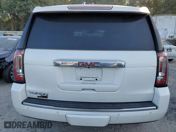 2019 GMC Yukon Denali with VIN 1GKS1CKJ8KR353280, listed as a Copart auction lot 77316454 with 74,476 mi miles and Salvage Title. Bid and sale history available at carsss.com. Image 6.