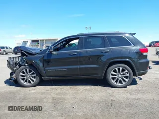 2017 Jeep Grand Cherokee Overland with VIN 1C4RJFCG0HC844713, listed as a IAAI auction lot 42293301 with 83,791 mi miles and . Bid and sale history available at DreamBid. Image 14.