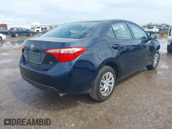 2019 Toyota Corolla L with VIN 5YFBURHE5KP874211, listed as a IAAI auction lot 41904269 with 109,217 mi miles. Bid and sale history available at carsss.com. Image 4.