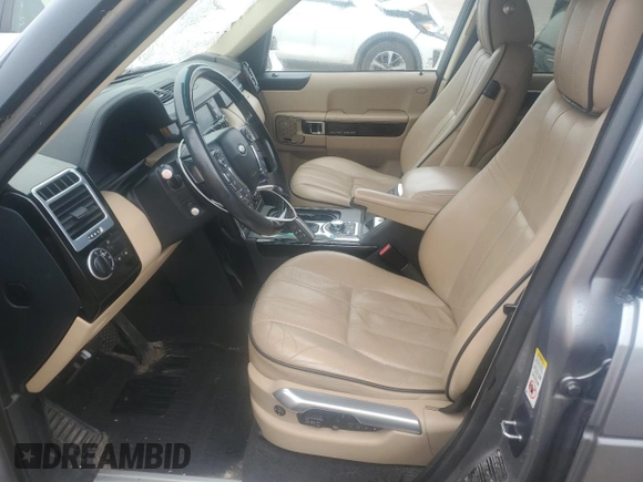 2012 Land Rover Range Rover HSE Lux with VIN SALMF1D44CA384472, listed as a Copart auction lot 60802735 with 130,960 mi miles and Salvage title. Bid and sale history available at DreamBid. Image 7.
