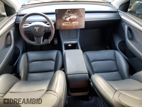 2024 Tesla Model Y Performance with VIN 7SAYGDEF2RF113873, listed as a Copart auction lot 46181915 with 19,625 mi miles and Salvage Title. Bid and sale history available at DreamBid. Image 8.