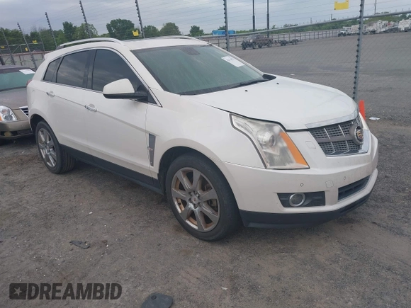 2011 Cadillac SRX Performance Collection with VIN 3GYFNBEY7BS585753, listed as a IAAI auction lot 42114525 with 233,329 mi miles and . Bid and sale history available at carsss.com. Image 1.