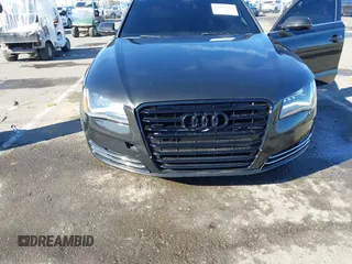 2011 Audi A8 z VIN WAURVAFD6BN019339, wystawiony jako IAAI lot #41560306 z przebiegiem 123 726 mil mil oraz . Historia ofert i sprzedaży dostępna na DreamBid. Obrazek 6.