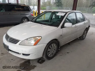 2006 Mitsubishi Lancer ES with VIN JA3AJ26E86U060513, listed as a IAAI auction lot 41980244 with 154,379 mi miles. Bid and sale history available at carsss.com. Image 2.
