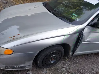 2004 Chevrolet Monte Carlo LS z VIN 2G1WW12E549283149, wystawiony jako IAAI lot #42393584 z przebiegiem 122 391 mil mil oraz . Historia ofert i sprzedaży dostępna na DreamBid. Obrazek 14.