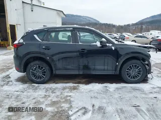 2019 Mazda CX-5 Sport with VIN JM3KFBBM8K1621929, listed as a IAAI auction lot 41356228 with 67,023 mi miles and . Bid and sale history available at DreamBid. Image 14.