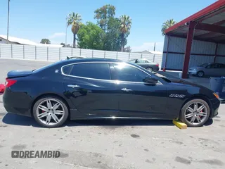 2018 Maserati Quattroporte S GranLusso z VIN ZAM56YPL1J1274060, wystawiony jako IAAI lot #42347208 z przebiegiem 55 022 mil mil oraz . Historia ofert i sprzedaży dostępna na DreamBid. Obrazek 14.
