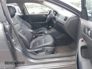 2014 Volkswagen Jetta SE z VIN 3VWD17AJ3EM225383, wystawiony jako IAAI lot #42172006 z przebiegiem 129 198 mil mil oraz . Historia ofert i sprzedaży dostępna na DreamBid. Obrazek 5.
