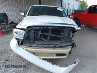2014 Ram 1500 Longhorn z VIN 1C6RR6PT0ES129729, wystawiony jako IAAI lot #42018089 z przebiegiem 126 074 mil mil oraz . Historia ofert i sprzedaży dostępna na DreamBid. Obrazek 13.