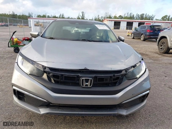 2019 Honda Civic Sedan LX with VIN 2HGFC2F62KH583213, listed as a IAAI auction lot 41935570 with 143,992 mi miles. Bid and sale history available at carsss.com. Image 13.