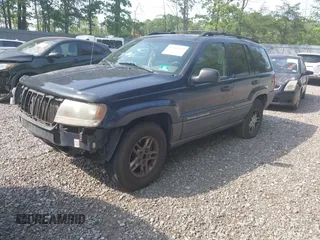 2004 Jeep Grand Cherokee Laredo with VIN 1J4GW48NX4C405558, listed as a IAAI auction lot 42440639 with 197,457 mi miles and . Bid and sale history available at DreamBid. Image 2.