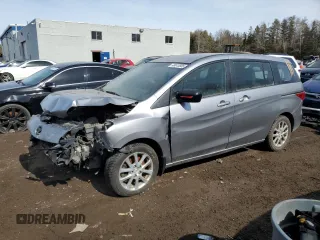 2015 Mazda 5 Touring with VIN JM1CW2CL4F0185773, listed as a Copart auction lot 48615505 with 105,488 mi miles and Salvage Title. Bid and sale history available at carsss.com. Image 1.