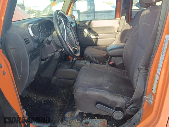 2013 Jeep Wrangler Unlimited Rubicon with VIN 1C4BJWFG7DL525994, listed as a Copart auction lot 46949855 with 179,499 mi miles and Salvage Title. Bid and sale history available at carsss.com. Image 7.
