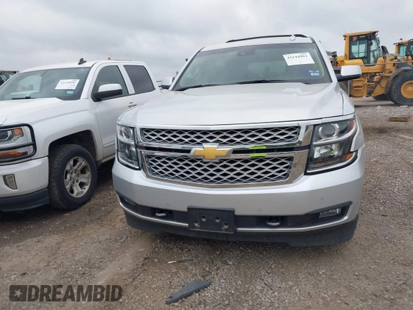 2019 Chevrolet Tahoe LT z VIN 1GNSCBKC1KR191789, wystawiony jako IAAI lot #42144961 z przebiegiem 94 178 mil mil oraz . Historia ofert i sprzedaży dostępna na DreamBid. Obrazek 12.