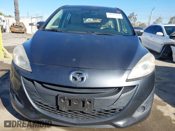 2014 Mazda 5 Sport with VIN JM1CW2BL5E0166522, listed as a IAAI auction lot 41635454 with 94,225 mi miles and . Bid and sale history available at DreamBid. Image 6.