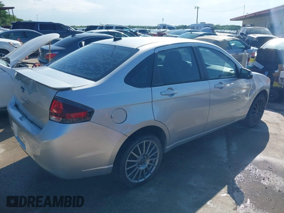 2010 Ford Focus SES with VIN 1FAHP3GN5AW115229, listed as a IAAI auction lot 42098503 with 156,127 mi miles. Bid and sale history available at carsss.com. Image 4.