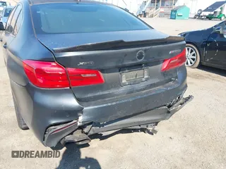 2018 BMW 5 Series M550i xDrive with VIN WBAJB9C55JB286747, listed as a IAAI auction lot 42583106 with 141,102 mi miles and . Bid and sale history available at DreamBid. Image 17.
