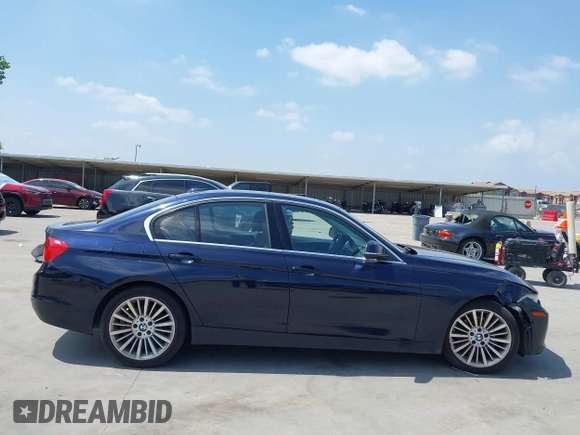 2013 BMW 3 Series 328i with VIN WBA3C1G51DNR49252, listed as a IAAI auction lot 42322739 with 119,421 mi miles and . Bid and sale history available at DreamBid. Image 13.