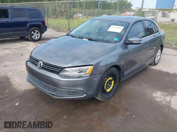 2014 Volkswagen Jetta TDI with VIN 3VWLL7AJ0EM386019, listed as a IAAI auction lot 42229260 with 122,858 mi miles and . Bid and sale history available at DreamBid. Image 2.