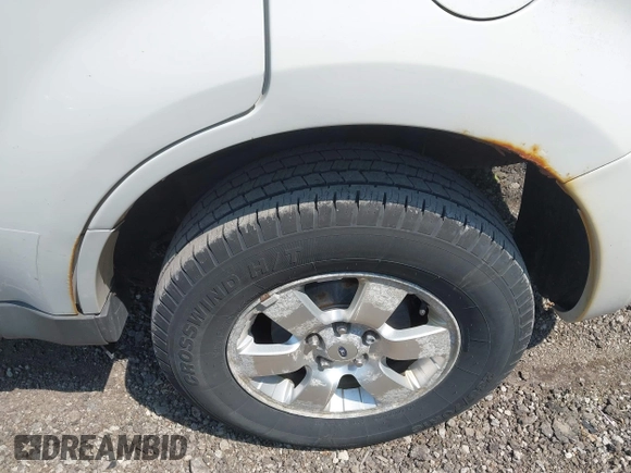 2010 Ford Escape Limited with VIN 1FMCU9EG8AKC42841, listed as a IAAI auction lot 42492355 with 159,939 mi miles and . Bid and sale history available at DreamBid. Image 16.
