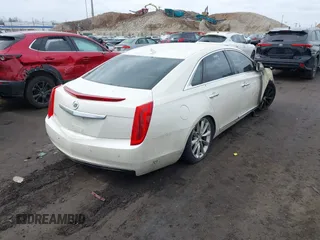 2013 Cadillac XTS with VIN 2G61N5S32D9114767, listed as a IAAI auction lot 41726593 with 70,572 mi miles. Bid and sale history available at carsss.com. Image 4.