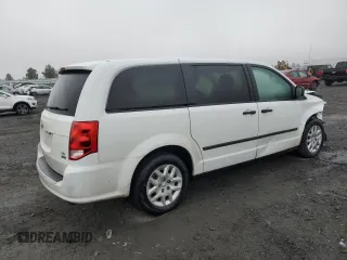 2015 Ram Cargo Van Tradesman with VIN 2C4JRGAG0FR679605, listed as a Copart auction lot 82867914 with 301,312 mi miles and Salvage Title. Bid and sale history available at carsss.com. Image 3.