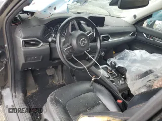 2018 Mazda CX-5 Grand Touring with VIN JM3KFADM3J1370114, listed as a Copart auction lot 54579585 with 65,513 mi miles and Salvage Title. Bid and sale history available at DreamBid. Image 8.