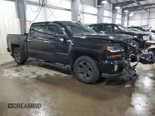 2017 Chevrolet Silverado 1500 LT with VIN 3GCUKREC2HG116505, listed as a Copart auction lot 53469345 with 118,329 mi miles and Salvage Title. Bid and sale history available at DreamBid. Image 4.